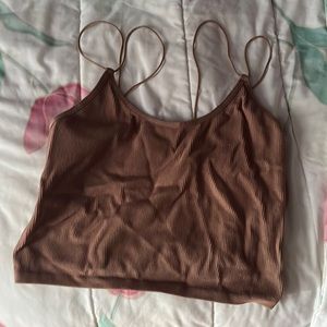 brown crop top with tag on.